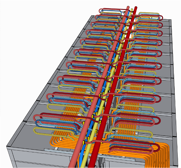 A 3D rendering of a complex plumbing and piping system. Multiple sets of red, yellow, blue, and orange pipes are shown intricately interwoven and connected on a large, grey platform. Some pipes run horizontally while others are coiled in